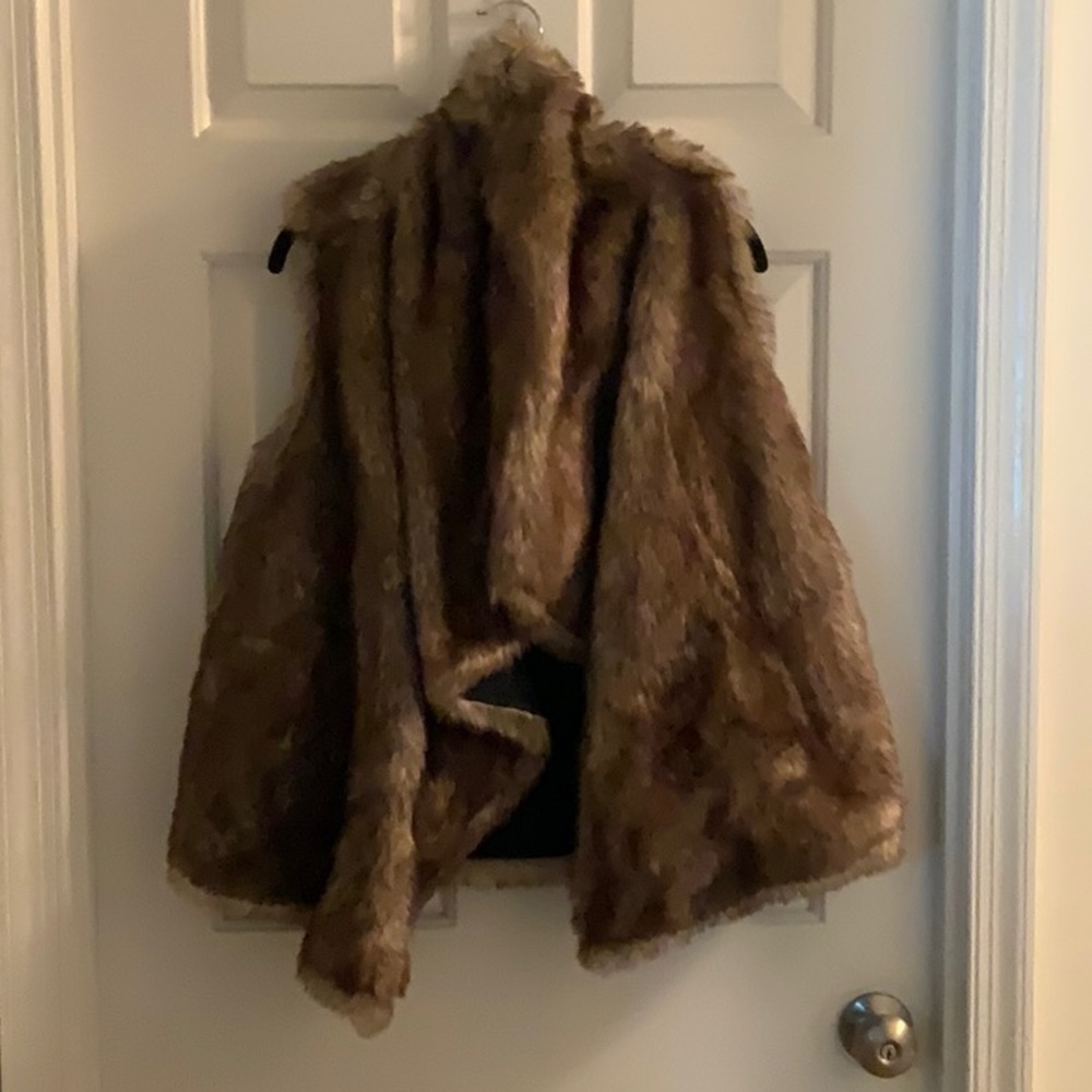 Faux fur vest. Reversible